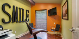 SMILE decorations for dental office on Orange and Green walls