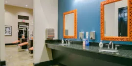 Turquoise and Orange Ortho Bay Sinks and Mirrors at Orthodontist Office