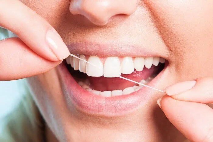 flossing-regulary-healthy-habit